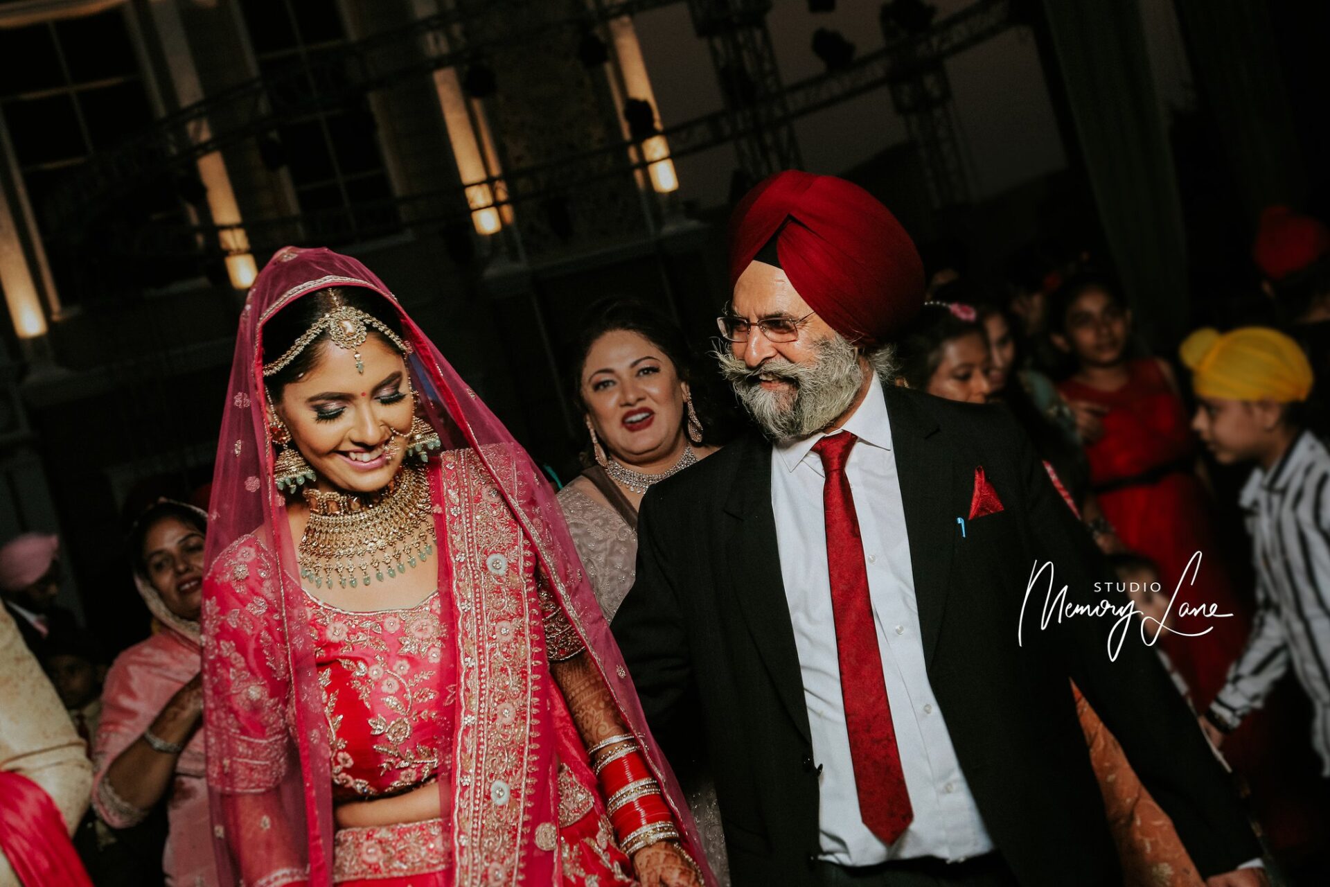Best candid wedding photographers Ludhiana | Like father, Like daughter!