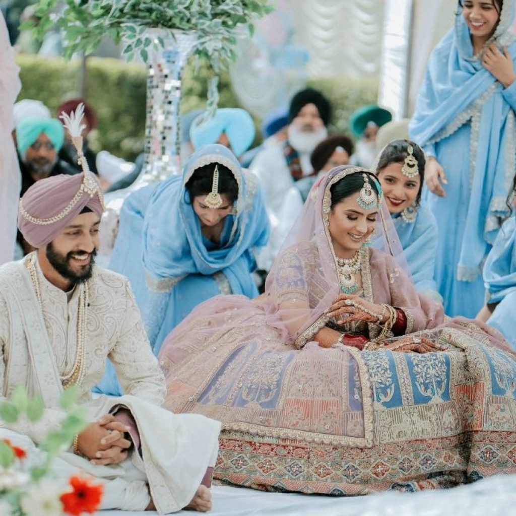 college friends turned into a loving couple- Couple all smiles during their wedding ceremony