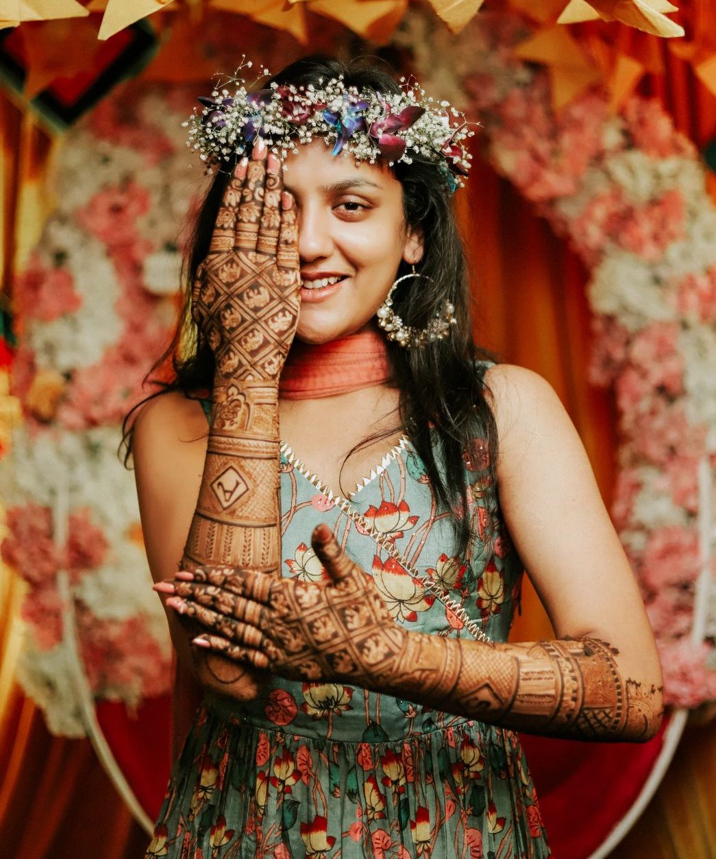 A Woman Wearing Lots of Accessories with Mehndi on Her Hand while Posing at  the Camera · Free Stock Photo