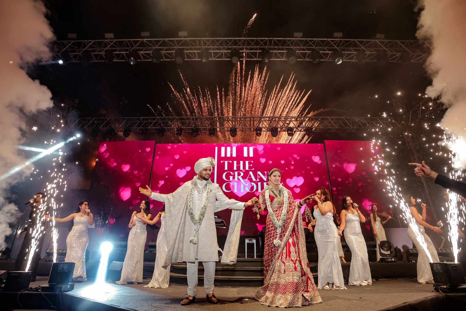 Bride and groom on stage after the varmala in candid moment soking it all in