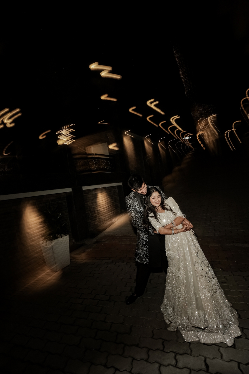 Beautiful candid shot of couple in dramatic lighting