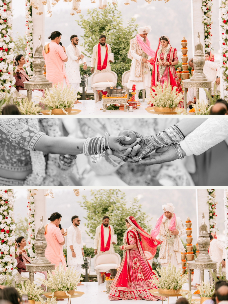 Bride and groom performing pheras beneath a floral mandap, exchanging sacred vows and holding hands during their traditional Indian wedding ceremony.